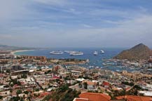five cruise ships in cabo san lucas harbor