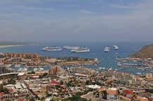 five cruise ships anchor in cabo san lucas harbor