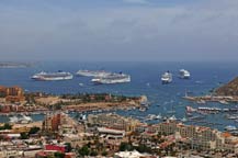 five cruise ships anchor in cabo san lucas harbor