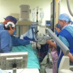 Dra. Sanchez [La Paz] sharing the catheterization lab with Omaha doctors.