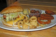 hooters los cabos - classic burger with fries and onion rings